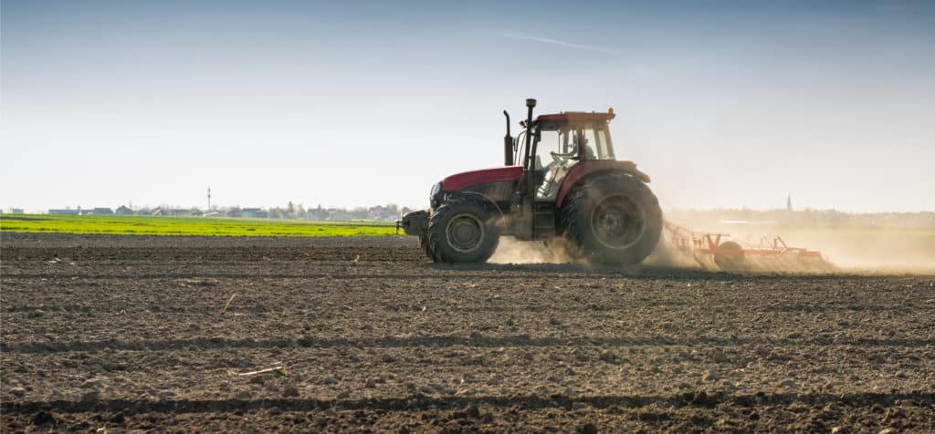 Tractor ploughing field