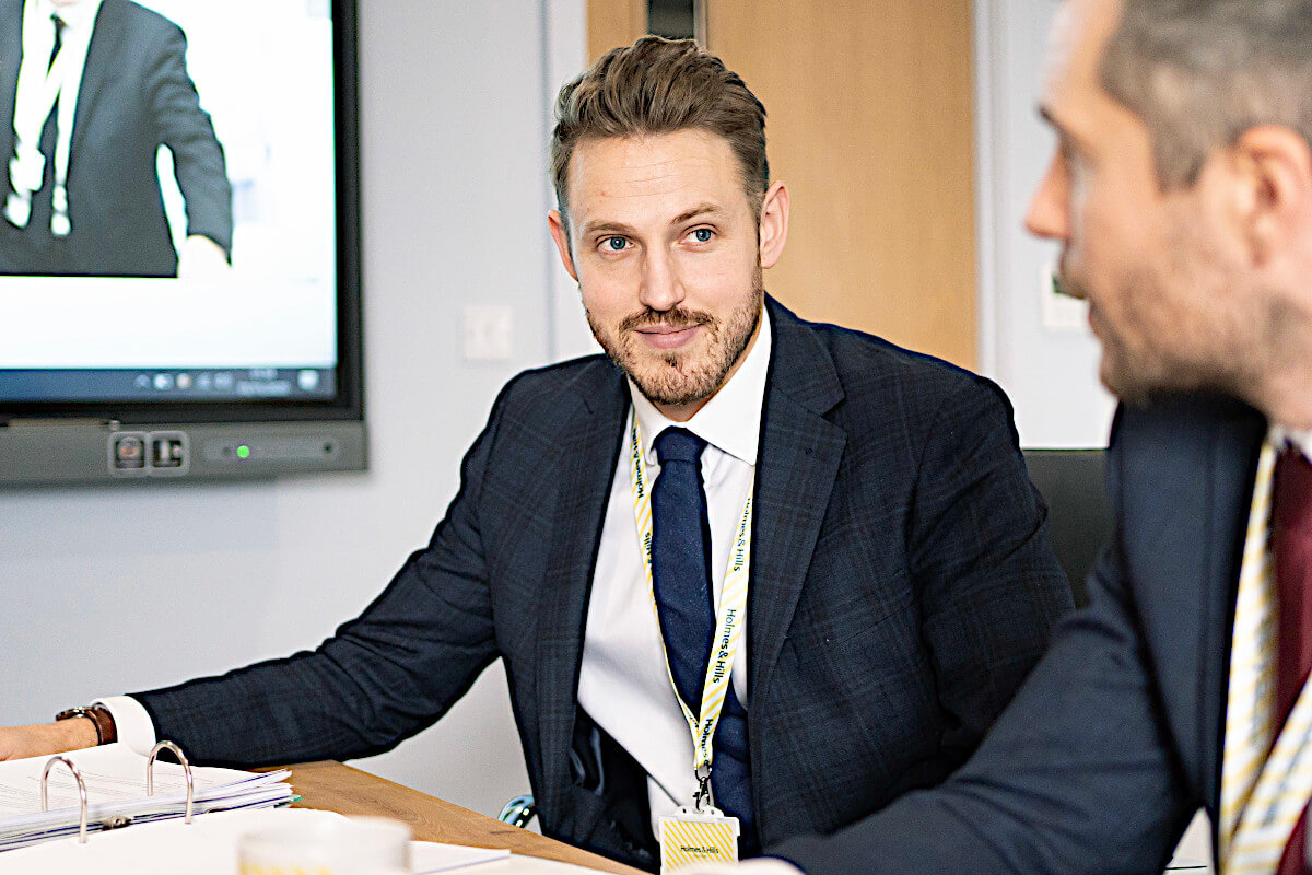 Lawrence Pearce in Boardroom tiny